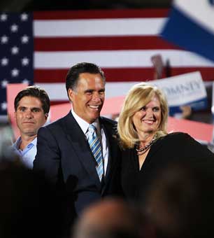 Republican presidential candidate Mitt Romney with his wife, Ann, and son, Tagg, at his primary night event in Manchester, New Hampshire, April 24, 2012. (Photo: Cheryl Senter / The New York Times) 